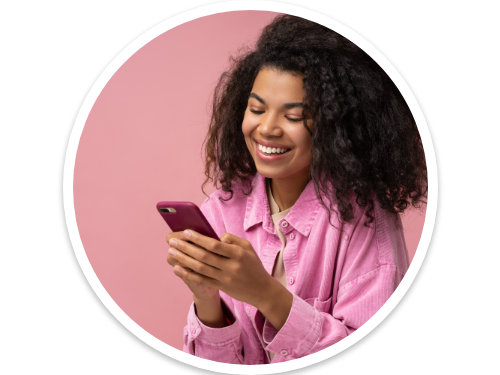Woman looking down at her smartphone smiling - 6 ways to make your marketing automation smarter webinar