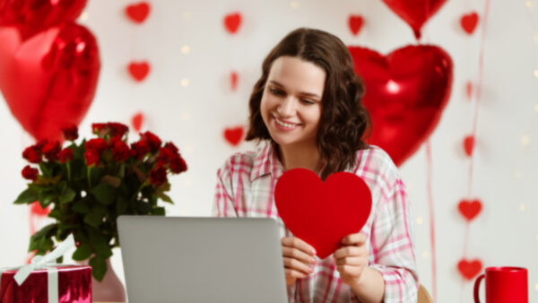 Marketer looking at Valentine’s Day email examples.