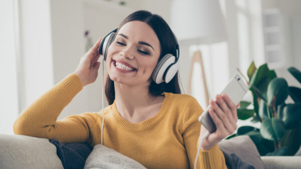 An individual enjoying a tailored Spotify playlist, immersed in their personalized music experience, powered by machine learning.